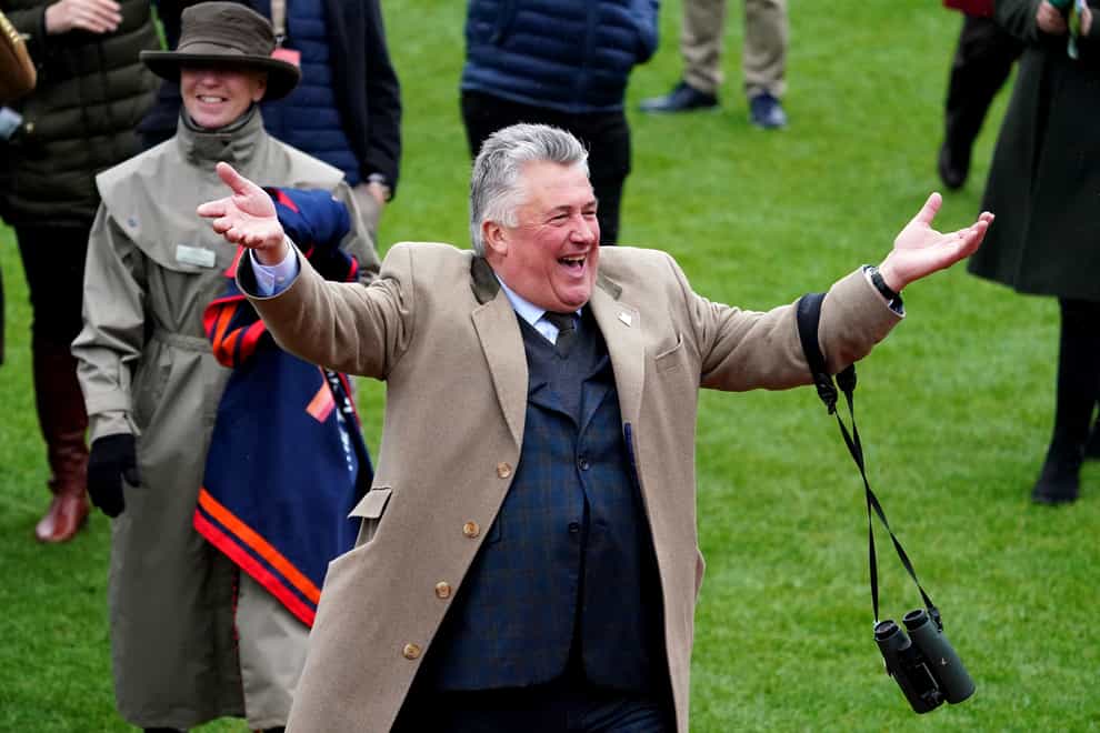 Trainer Paul Nicholls celebrates after Stage Star’s victory at the Cheltenham Festival (Tim Goode/PA)
