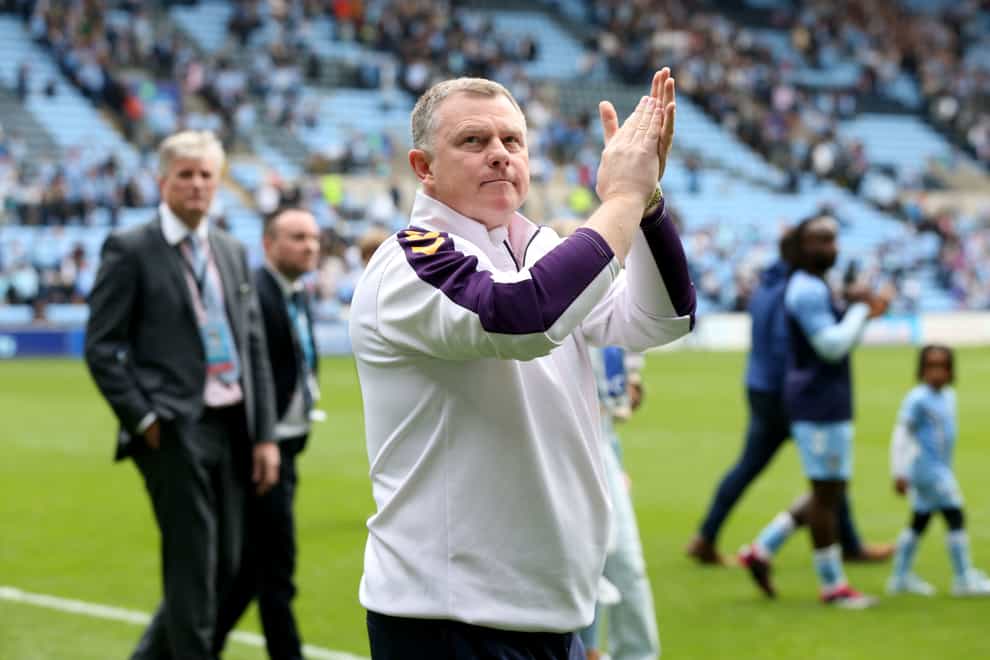 Coventry City manager Mark Robins applauds the fans after the win (Barrington Coombs/PA)