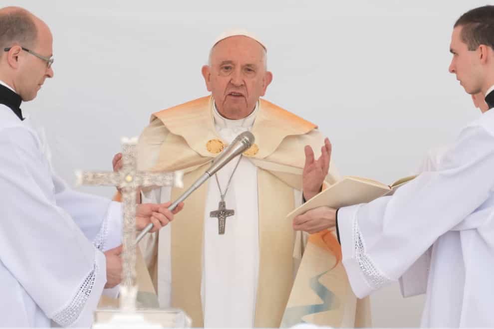 Pope Francis delivers his blessing as he starts a Mass in Kossuth Lajos Square in Budapest (Andrew Medichini/AP)