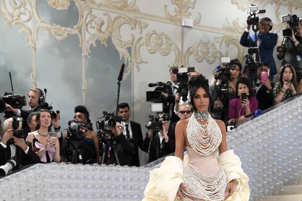 Kim Kardashian paid tribute to Karl Lagerfeld at the Met Gala in a pearl-themed outfit (Evan Agostini/AP)