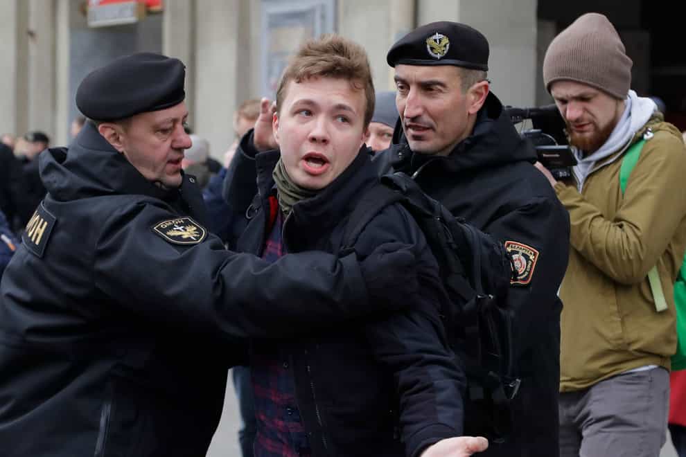 Belarus police arrest journalist Raman Pratasevich in March 2017 (AP)