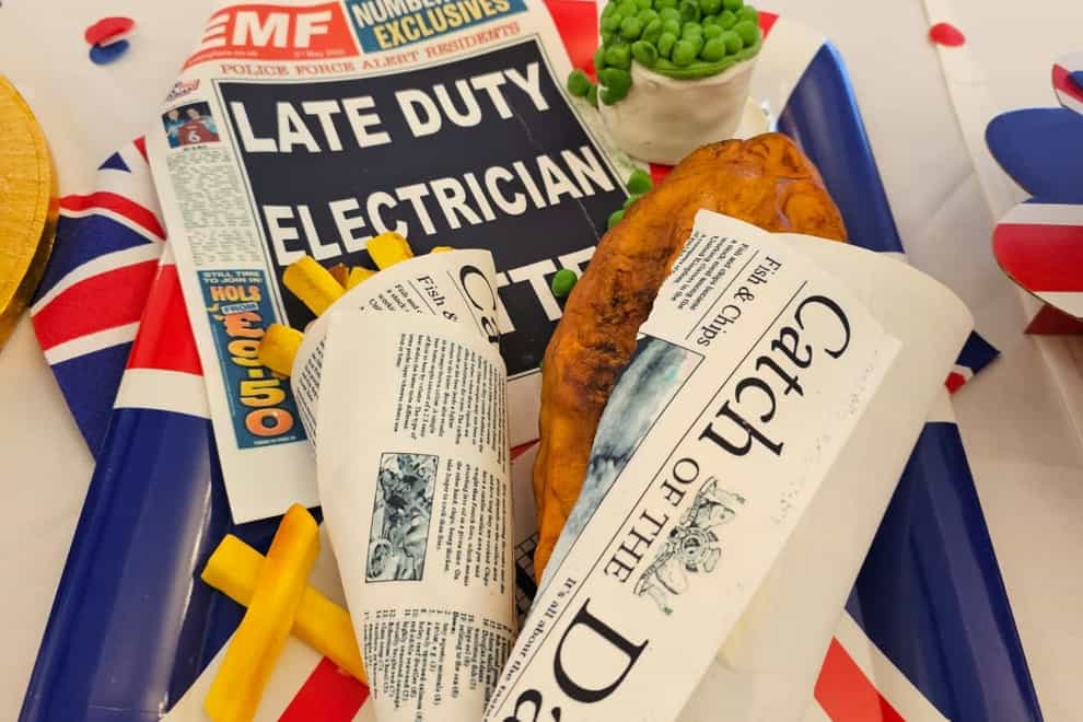 A fish and chip cake complete with Old Bailey-themed newspaper, which was the winning entry in the Central Criminal Court’s charity bake off (Jo Mansfield/PA)