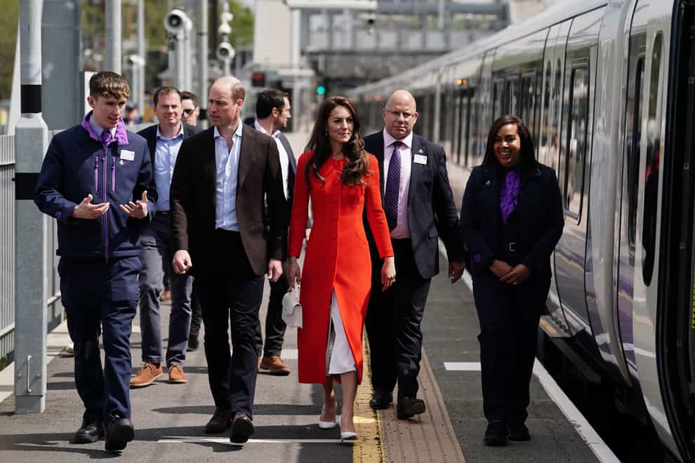 The Prince and Princess of Wales travelled on London Underground’s Elizabeth Line on their way to visit the Dog and Duck pub in Soho (Jordan Pettitt/PA)