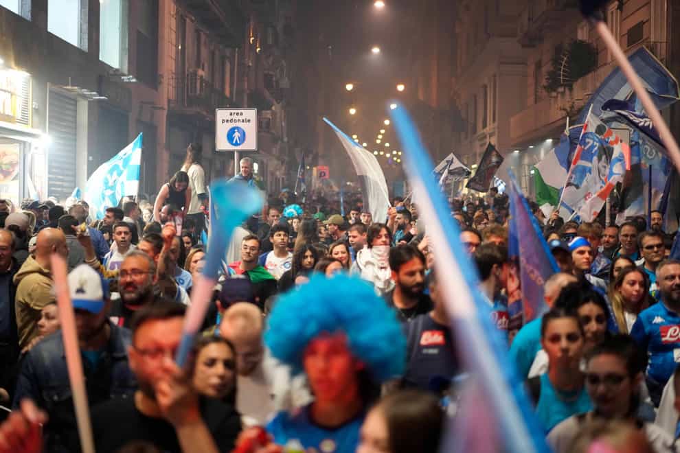 Napoli fans celebrate after winning the Italian league soccer title (AP)