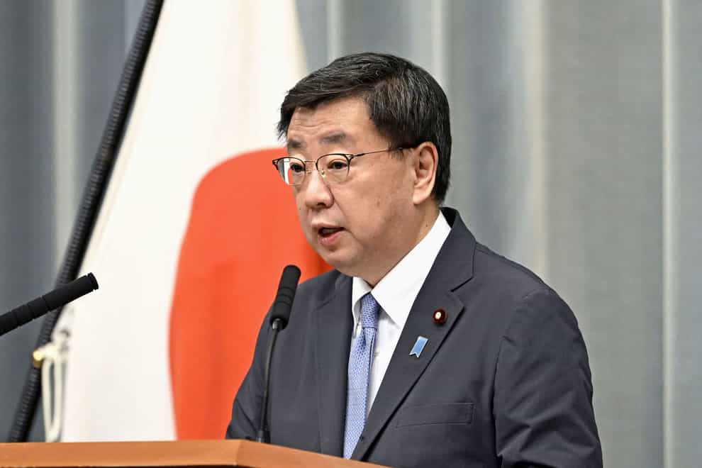 Japanese government spokesman Hirokazu Matsuno (Kyodo News via AP)