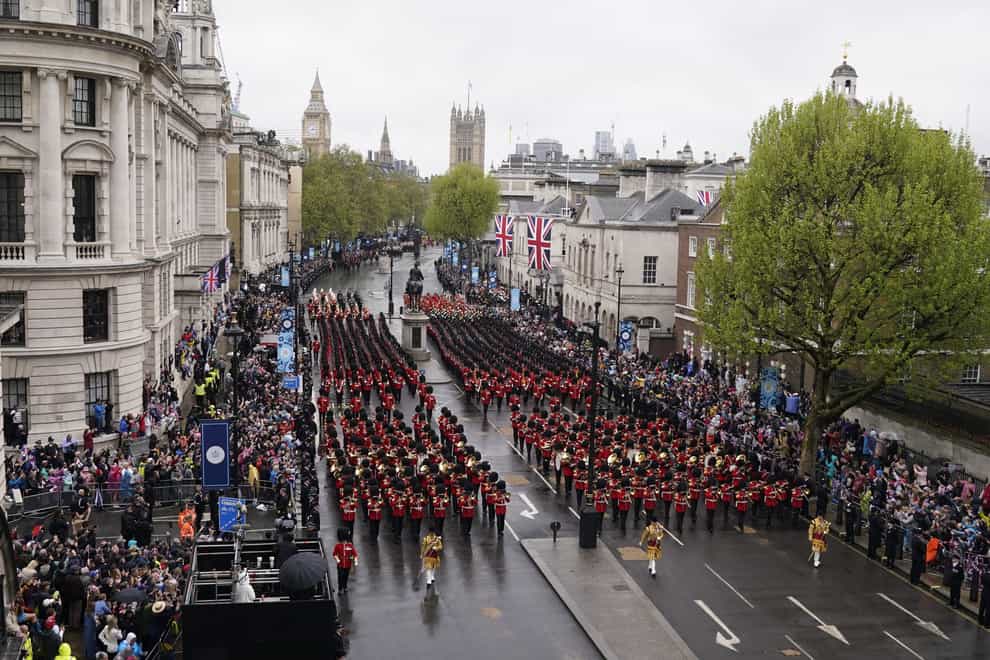 The procession passes along The Mall to Buckingham Palace (Danny Lawson/PA)