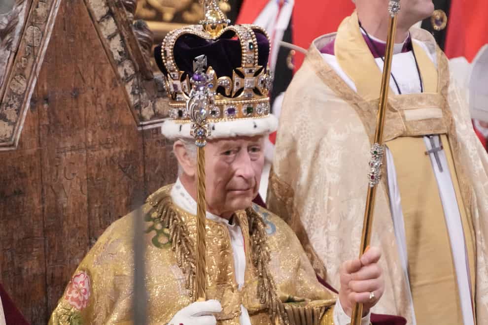 The King is crowned with St Edward’s Crown (Jonathan Brady/PA)