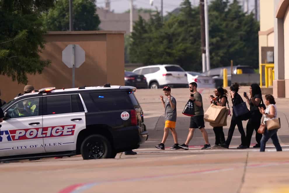 A gunman shot multiple people at an outlet mall in the Dallas suburb of Allen, Texas, on Saturday, killing an unknown number (LM Otero/AP)