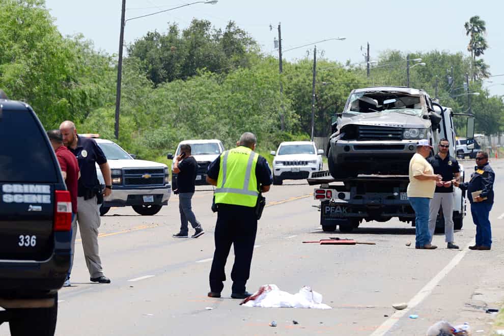 The death toll from a vehicle hitting a crowd of people waiting for a bus outside a migrant shelter in Texas has risen to eight, police have said (Miguel Roberts/The Brownsville Herald/AP)