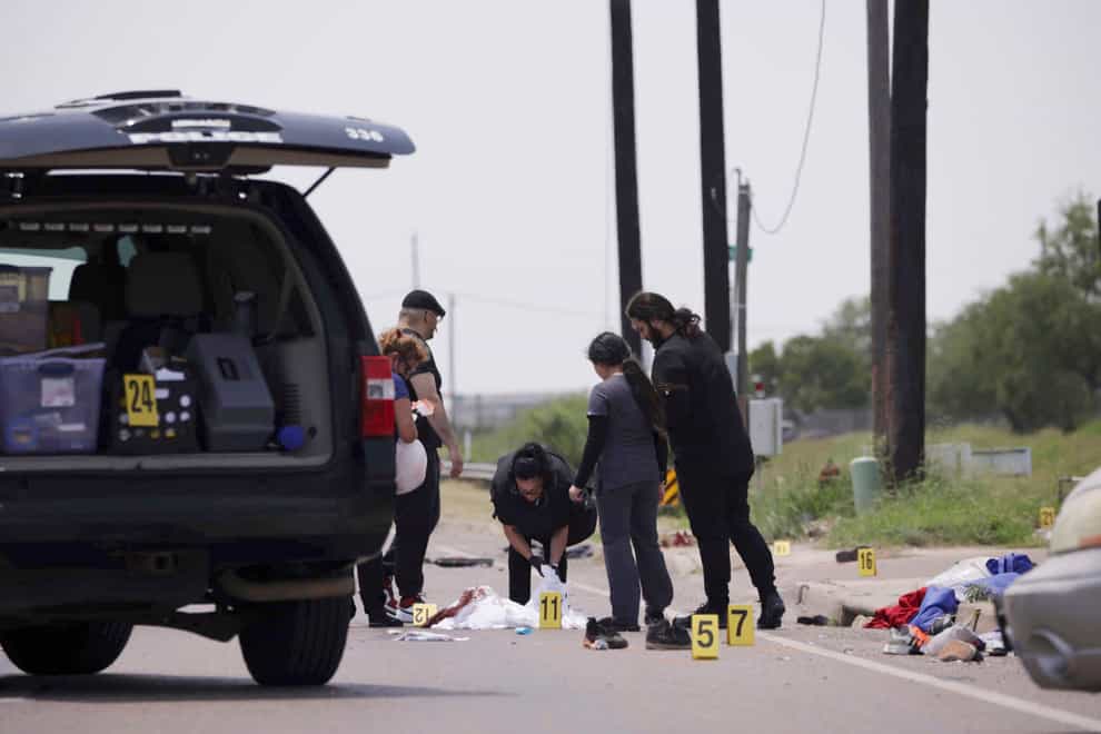 Emergency personnel respond to the fatal collision in Brownsville (Michael Gonzalez/AP)