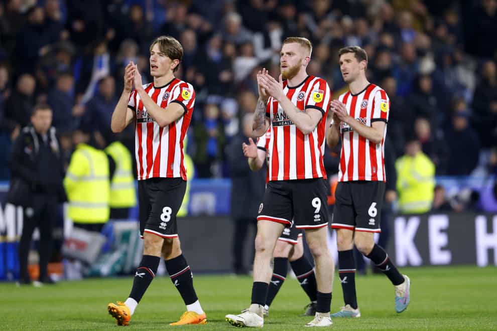 Sheffield United’s Sander Berge (left), Oli McBurnie and Chris Basham applaud the fans at the end of the Sky Bet Championship match at John Smith’s Stadium, Huddersfield. Picture date: Thursday May 4, 2023.