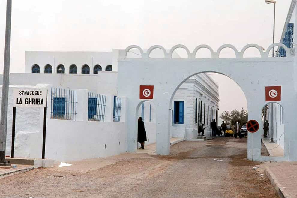 The Tunisian Interior Ministry says a naval guard shot and killed a colleague and two civilians Tuesday, May 9, 2023, near the synagogue during an annual Jewish pilgrimage. (Hassene Dridi, AP Photo)