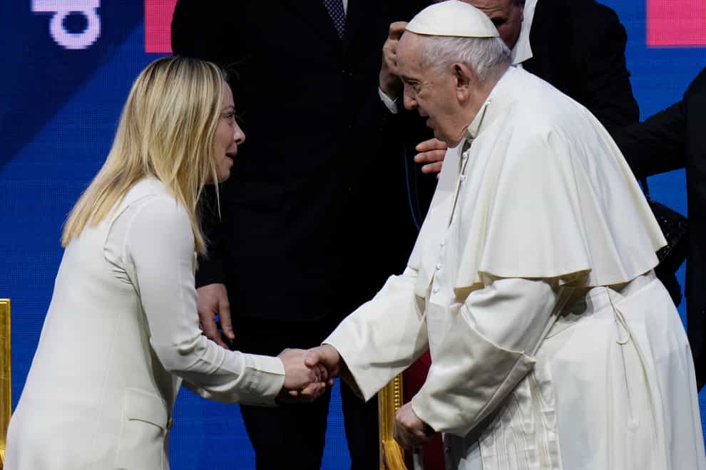 Pope Francis greets Italian Premier Giorgia Meloni (AP)