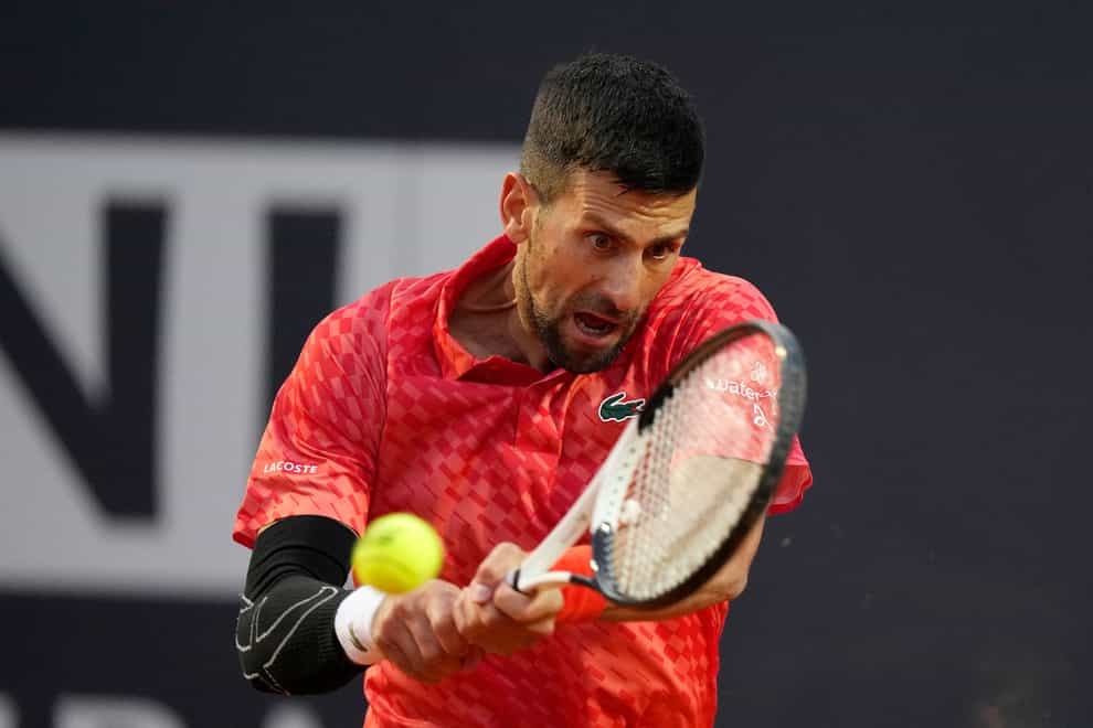 Novak Djokovic had strapping on his right elbow (Andrew Medichini/AP)