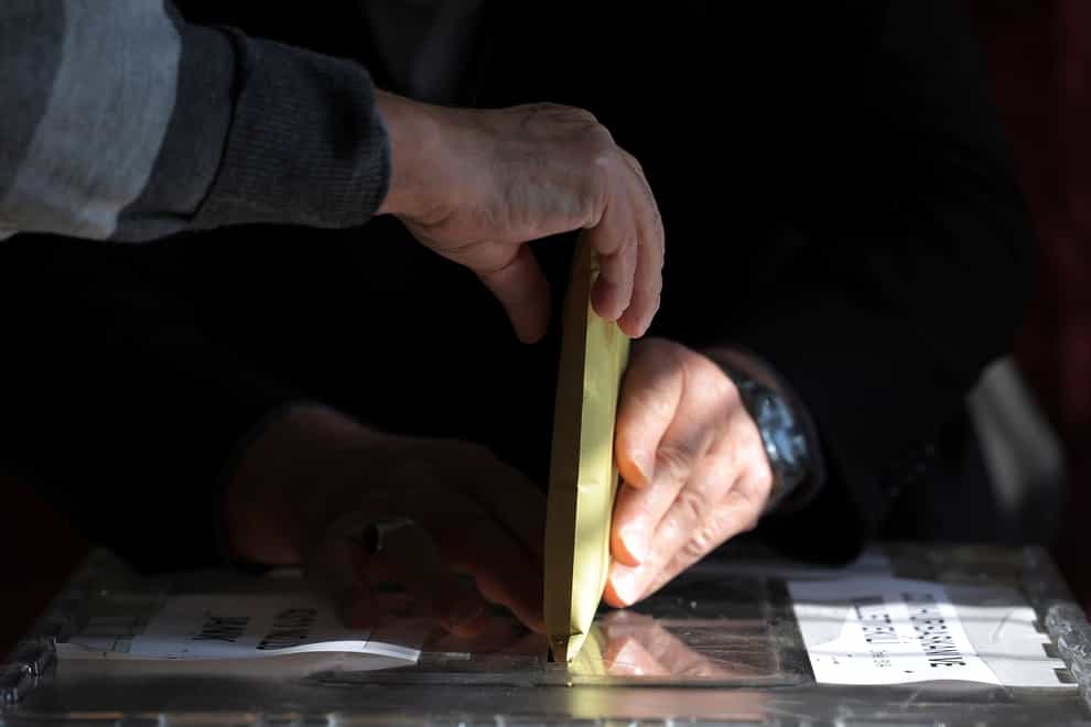 A man votes at a polling station in Ankara, Turkey (AP Photo)