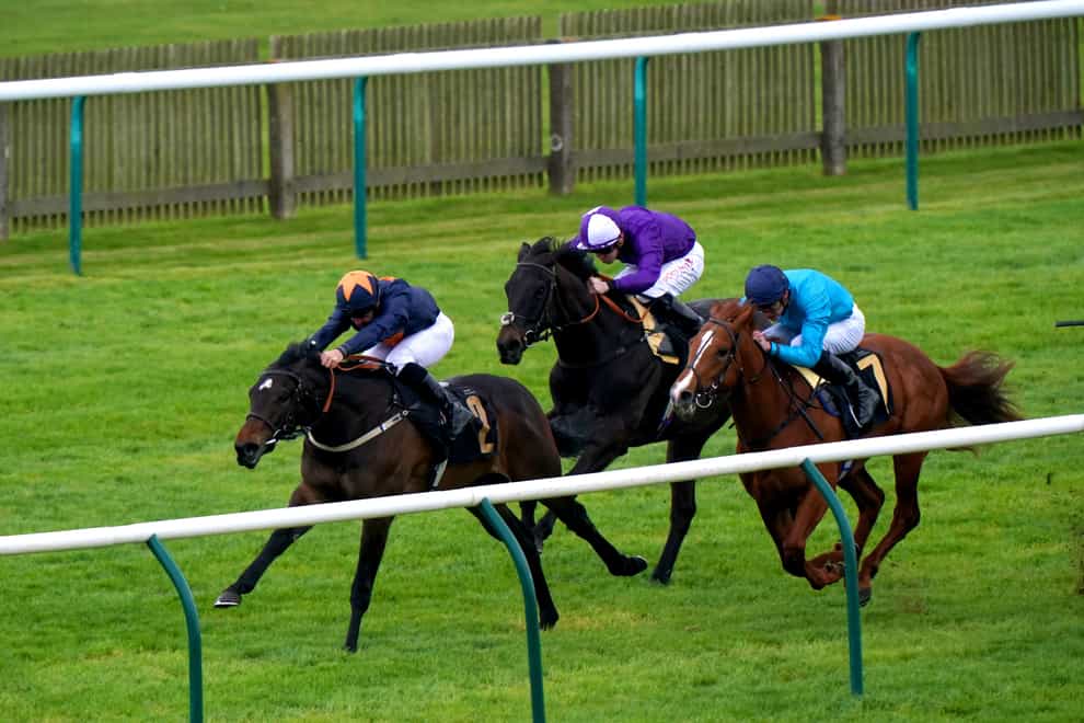 Blue Storm ridden by jockey Neil Callan (left) on their way to winning the Pat Smullen Memorial British EBF Novice Stakes on day one of the bet365 Craven Meeting at Newmarket Racecourse. Picture date: Tuesday April 18, 2023. (Tim Goode/PA)