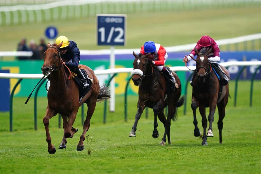 Infinite Cosmos ridden by Ryan Moore (left) on their way to winning the Nyetimber Maiden Fillies’ Stakes on day one of The QIPCO Guineas Festival at Newmarket Racecourse. Picture date: Friday May 5, 2023.