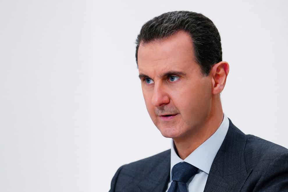 Bashar Assad has been invited to attend the Cop28 climate talks (Sana via AP, File)