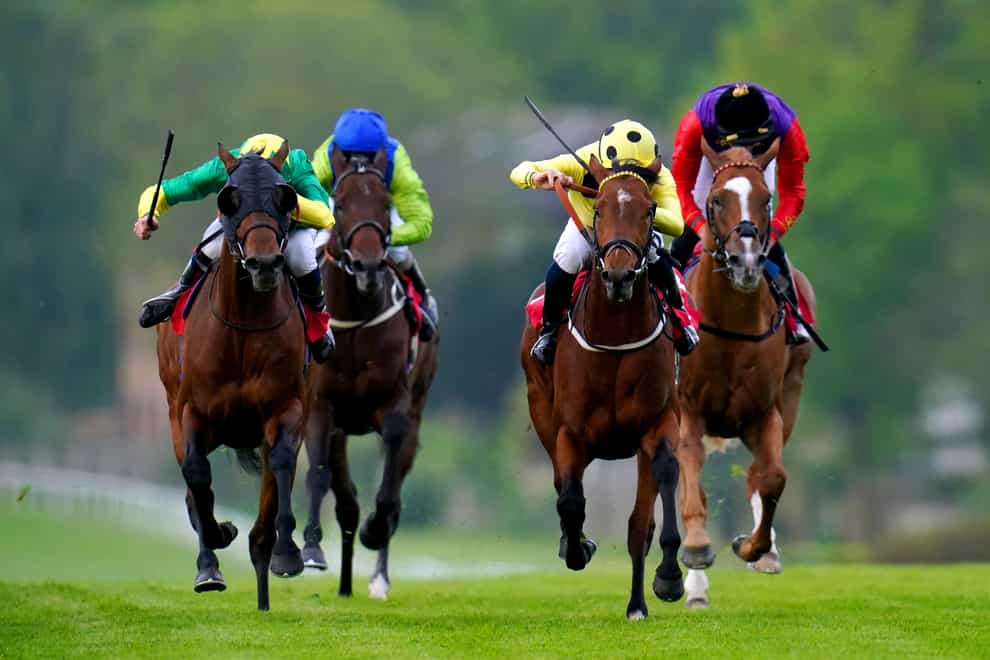 Captain Winters ridden by jockey Neil Callan (second right) on their way to winning the Heron Stakes at Sandown Park Racecourse, Surrey. Picture date: Tuesday May 16, 2023. (John Walton/PA)
