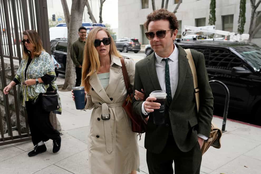 Danny Masterson and his wife Bijou Phillips arrive for closing arguments in his second rape trial (AP Photo/Chris Pizzello)