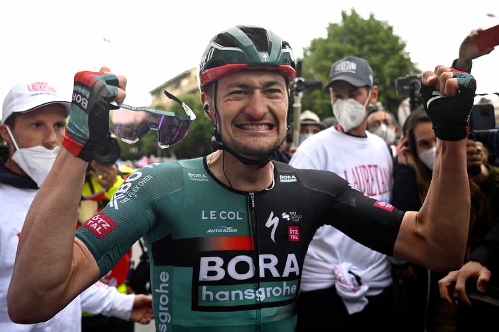 Germany’s Nico Denz celebrates his first Grand Tour stage win at the Giro d’Italia (Fabio Ferrari/AP)