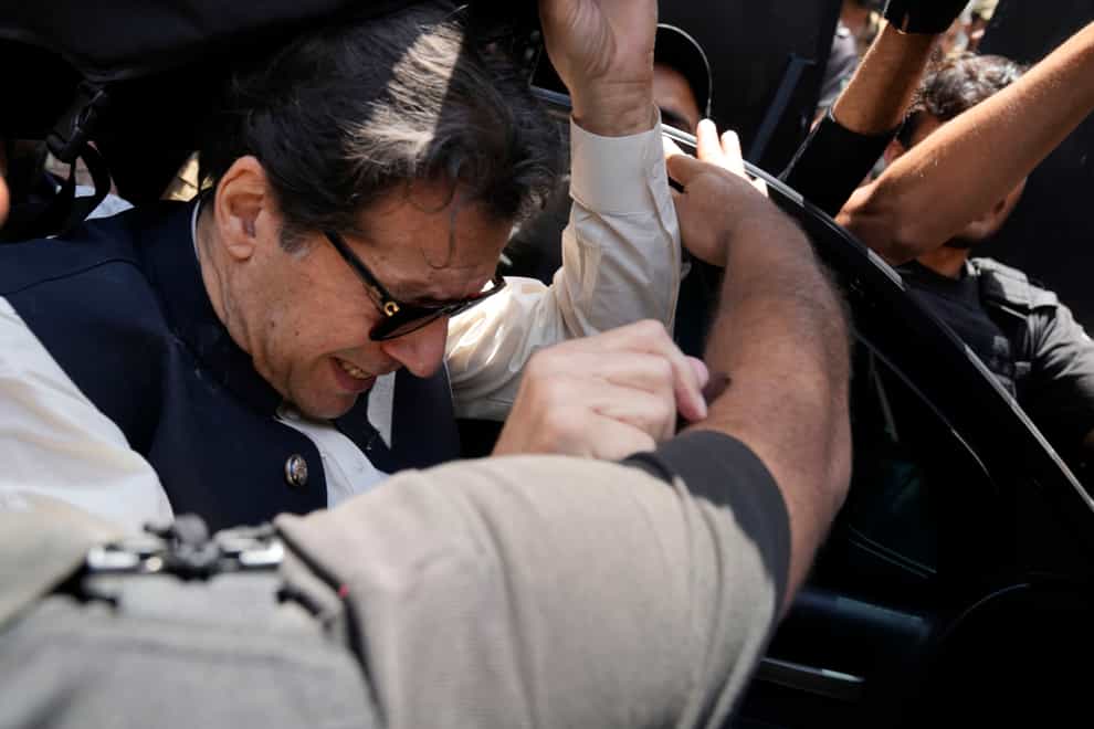 Imran Khan, arrives to appear before a court in Lahore (AP)