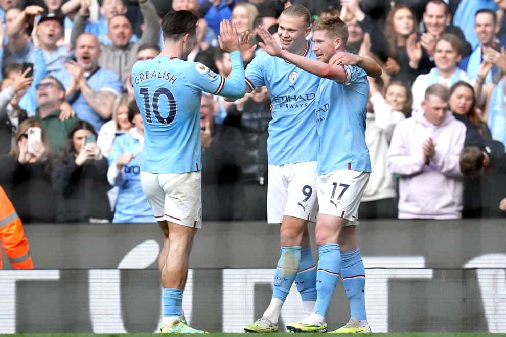 Erling Haaland, centre, Jack Grealish, left, and Kevin De Bruyne have excelled in Manchester City’s title win (Nick Potts/PA)