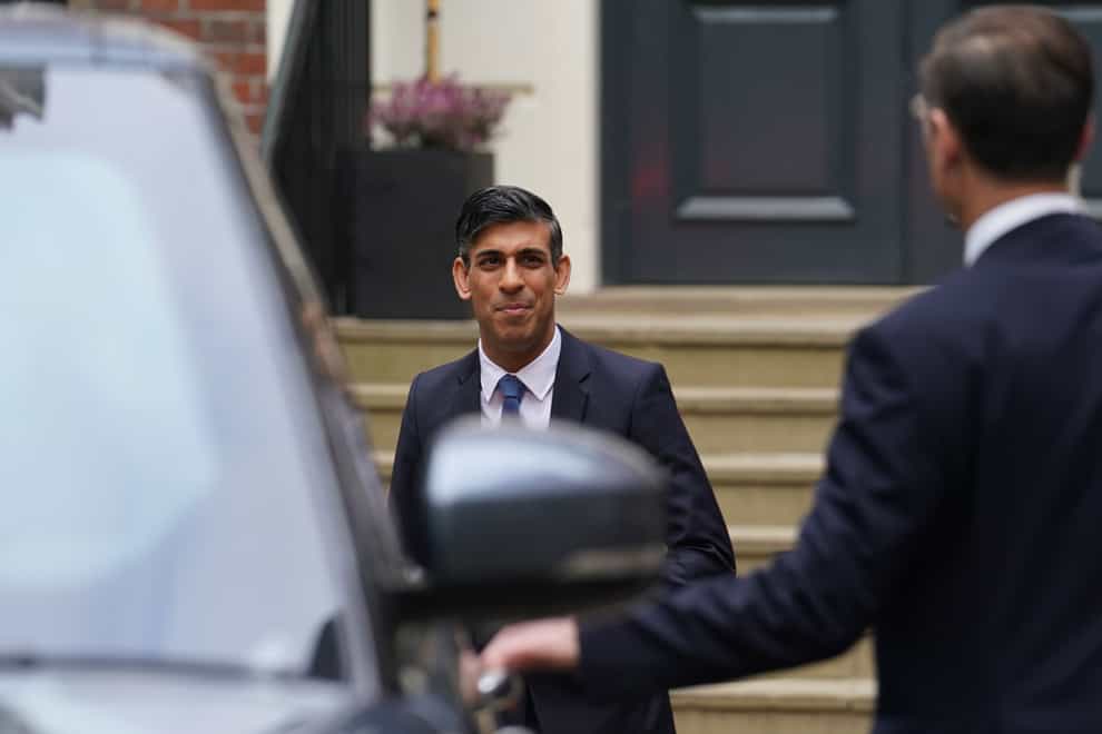 Prime Minister Rishi Sunak leaves the Conservative Party headquarters in central London, after the party suffered council losses in the local elections (Stefan Rousseau/PA)