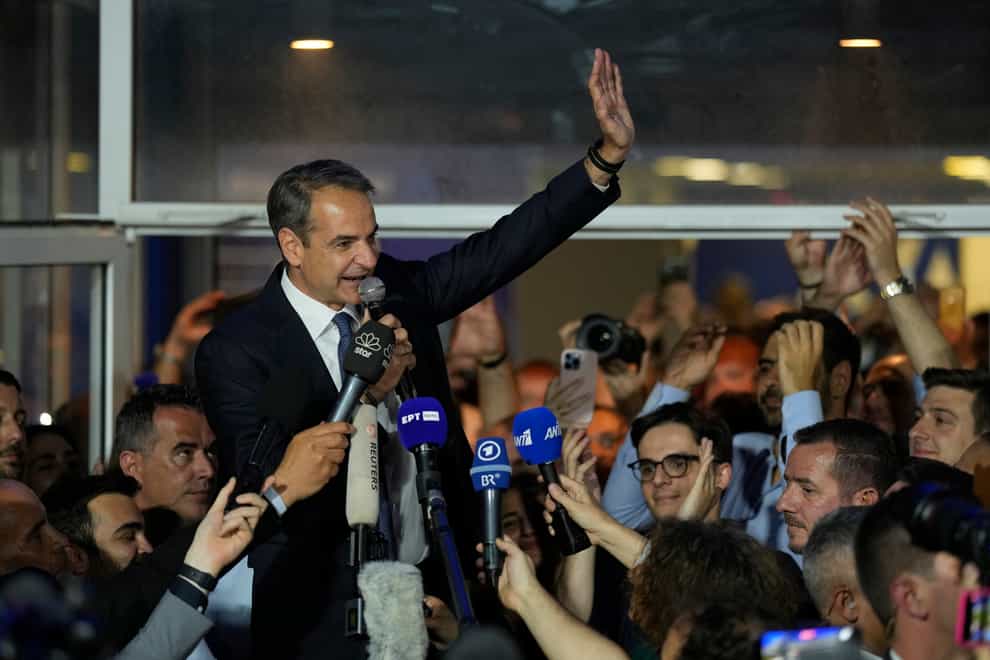 Kyriakos Mitsotakis addresses supporters at the headquarters of his party in Athens (Petros Giannakouris/AP)