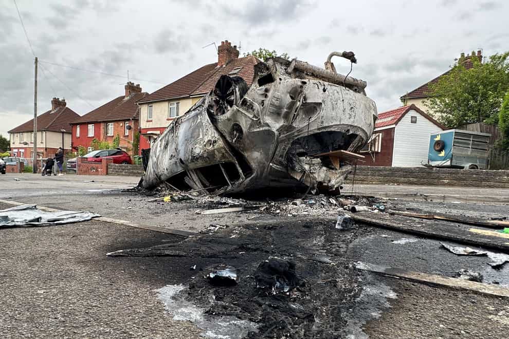 The scene in Ely, Cardiff, following the riot that broke out after two teenagers died in a crash (PA)