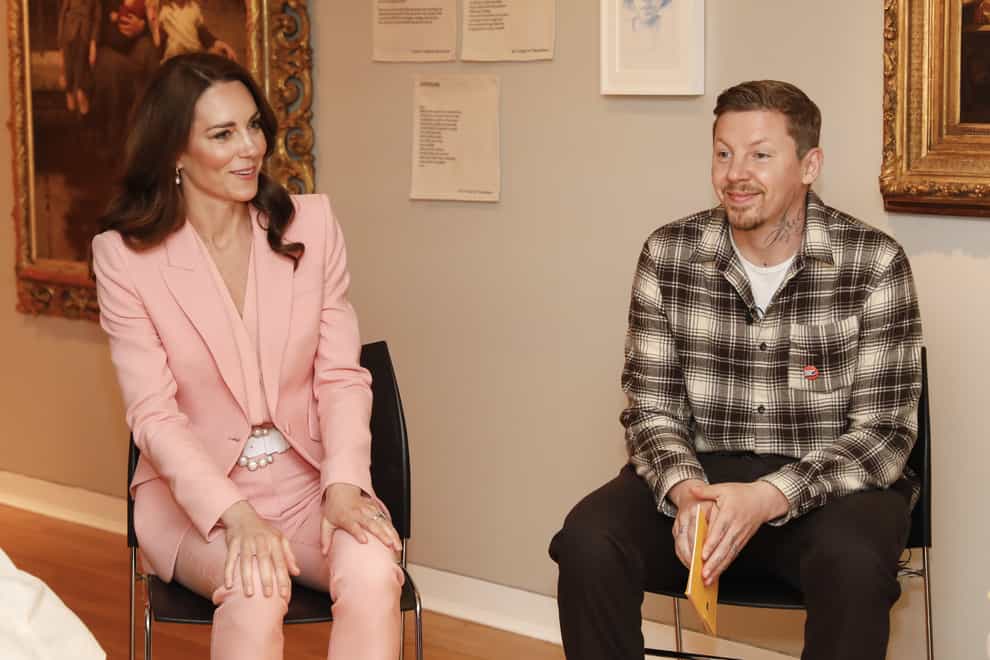 The Princess of Wales sits beside Professor Green during a visit to the Foundling Museum in London (Tristan Fewings/PA)