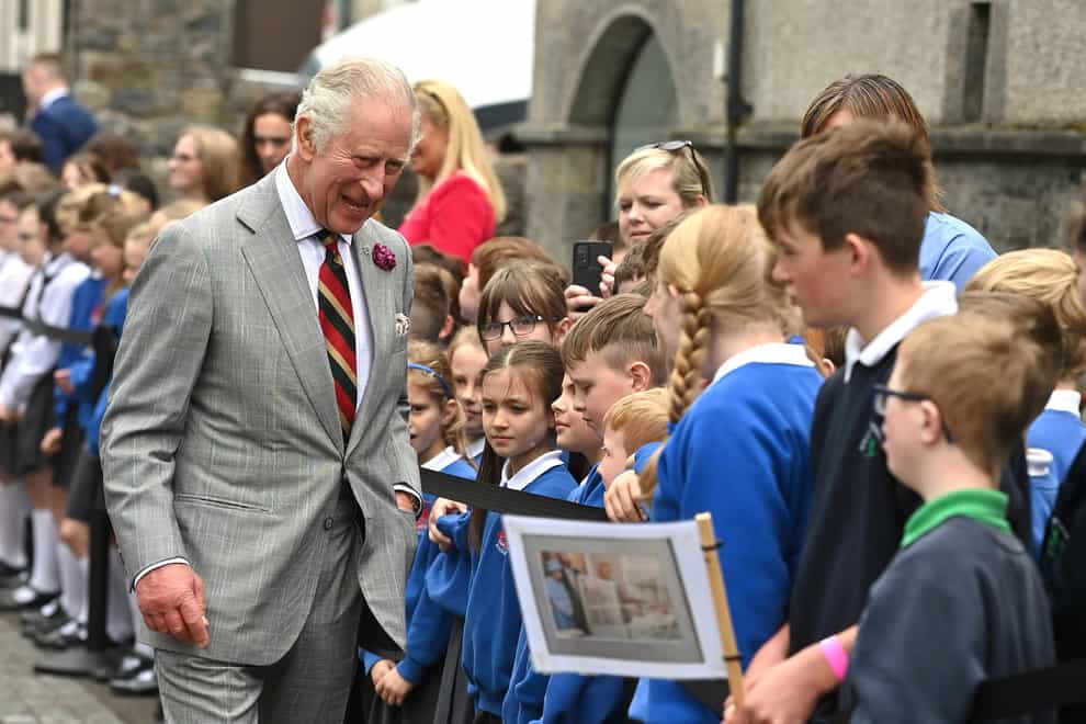 The King met schoolchildren during his visit to Enniskillen Castle in Co Fermanagh (Oliver McVeigh/PA)