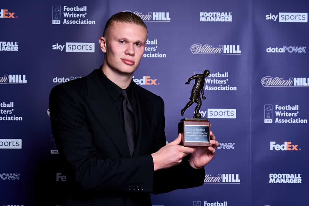 Erling Haaland with his FWA Footballer of the Year trophy (John Walton/PA)