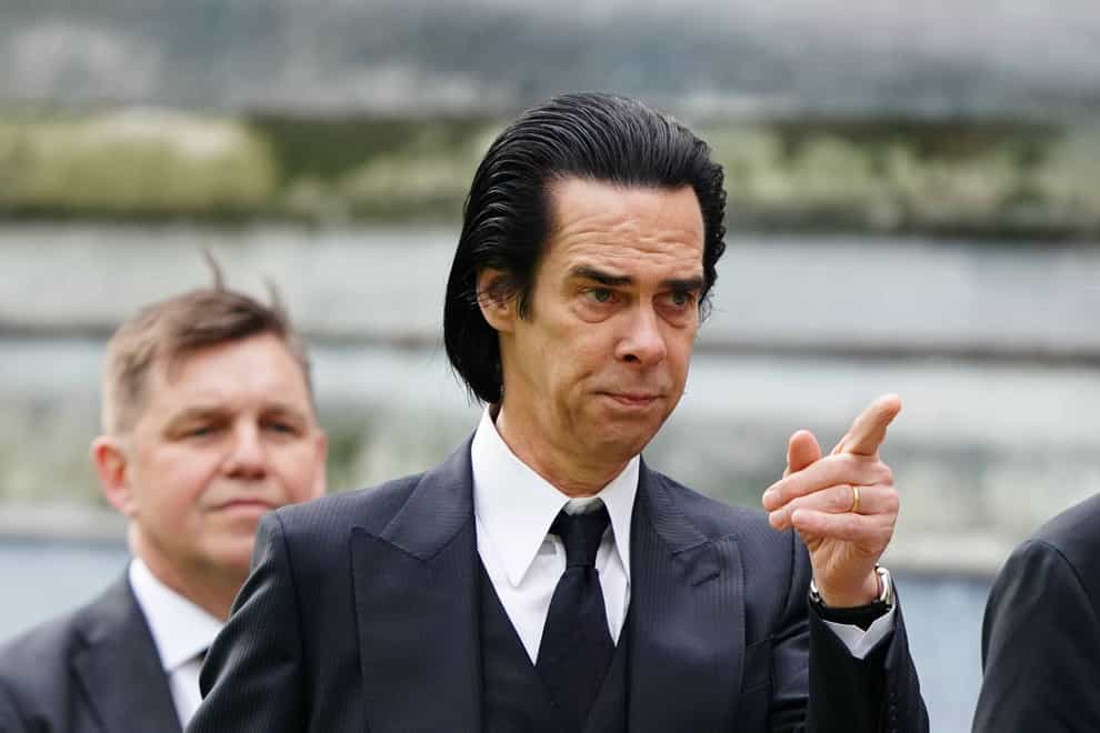 Nick Cave said he was ‘extremely bored and completely awestruck’ when he attended the coronation at Westminster Abbey (Jane Barlow/PA)