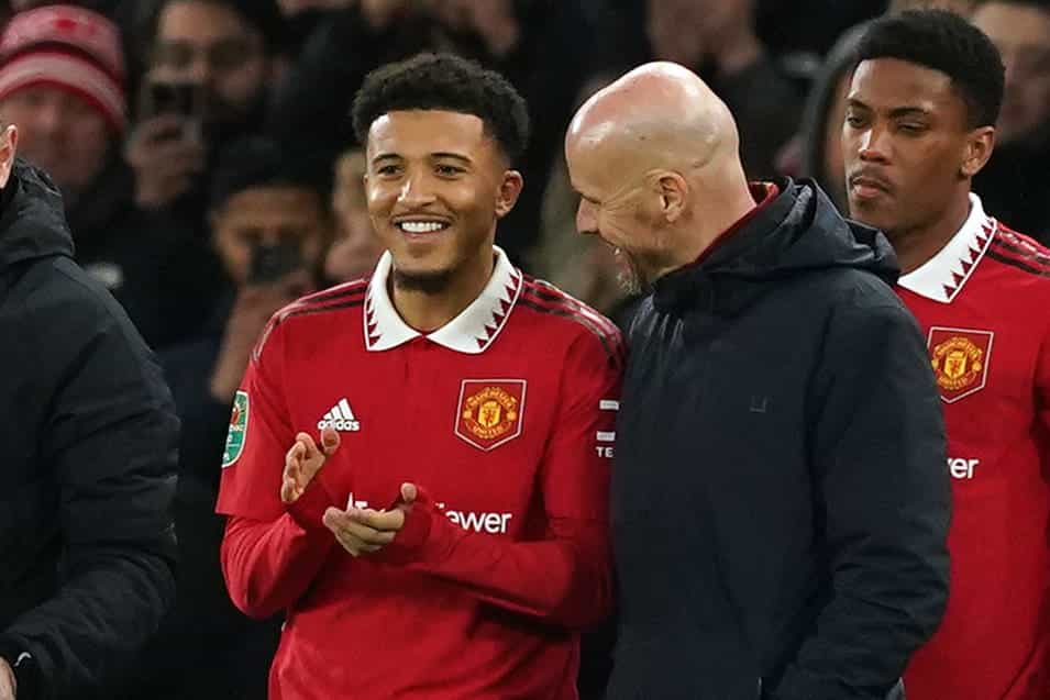 Manchester United’s Jadon Sancho with manager Erik ten Hag as he comes off the bench to make a substitute appearance during the Carabao Cup semi-final, second leg match at Old Trafford, Manchester. Picture date: Wednesday February 1, 2023.