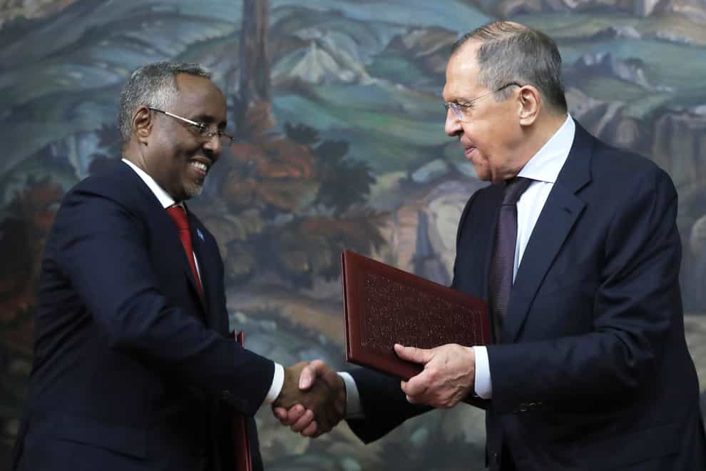 Russian Foreign Minister Sergey Lavrov, right, and Somalia’s Foreign Minister Abshir Omar Jama attend a signing ceremony following their talks in Moscow (Maxim Shipenkov/Pool Photo via AP/PA)