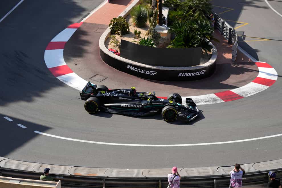 Lewis Hamilton in action in the new Mercedes around the streets of Monaco (Luca Bruno/AP)