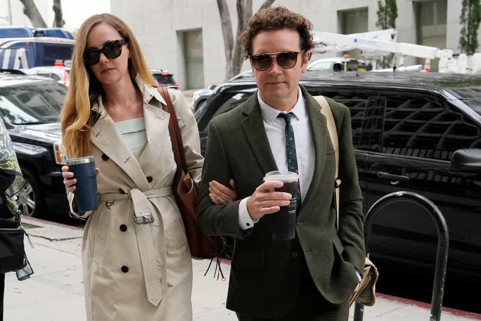 Danny Masterson and his wife Bijou Phillips arrive at court (Chris Pizzello/AP/PA)