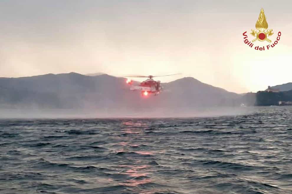 A tourist boat capsized in a storm on Italy’s Lago Maggiore in the northern Lombardy region on Sunday, with at least two people confirmed dead, Italian media reported (Vigili Del Fuoco/AP)