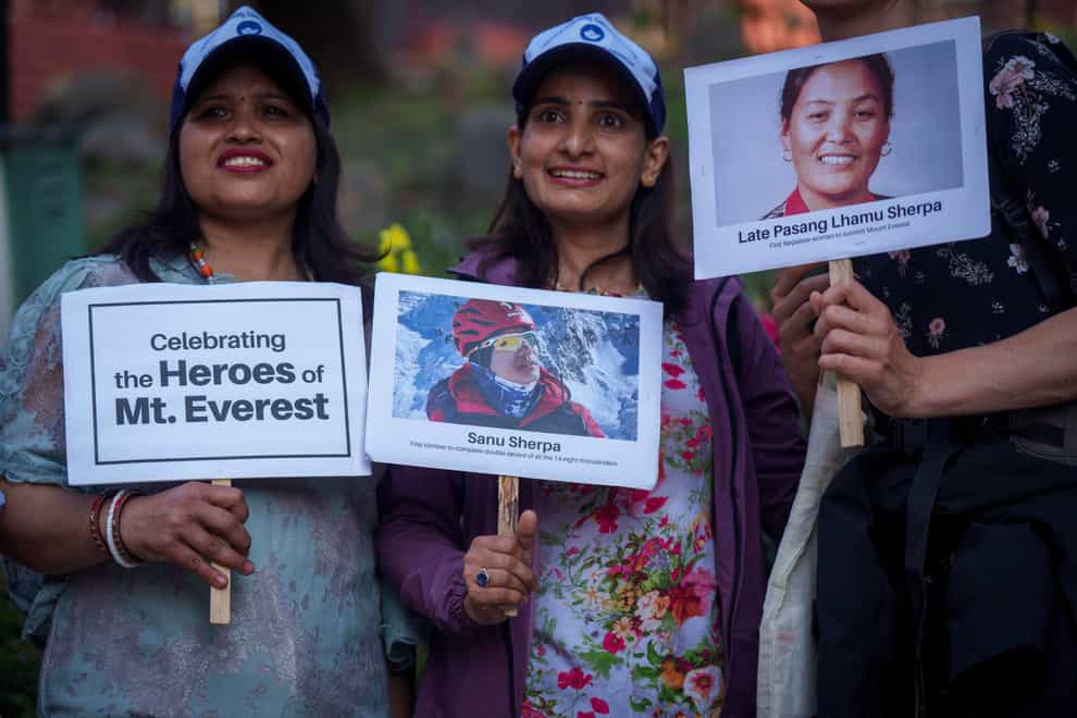 People celebrate famous mountaineers on the 70th anniversary of the conquest of Everest (AP)