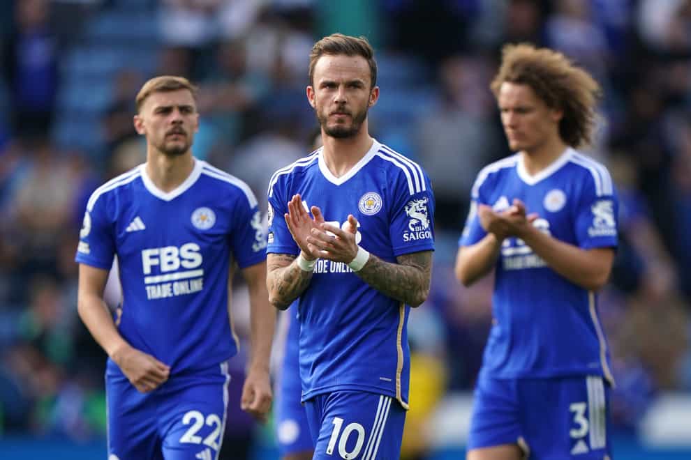 James Maddison, centre, looks dejected following Leicester’s relegation from the Premier League (Joe Giddens/PA)