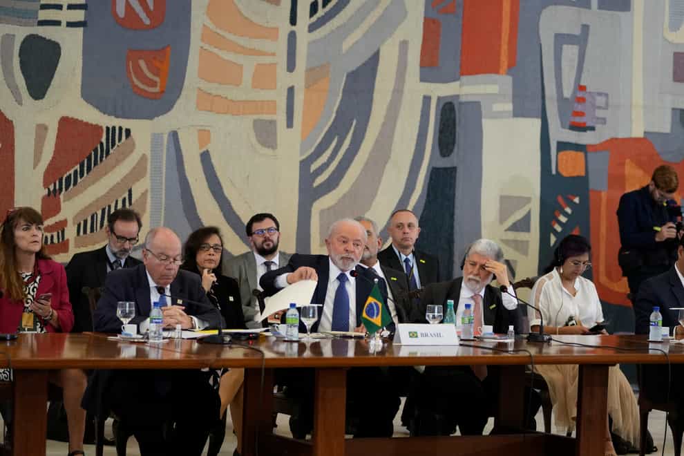 Brazilian President Luiz Inacio Lula da Silva, centre, hosts leaders at the South American Summit at Itamaraty palace in Brasilia, Brazil (Andre Penner/AP/PA)