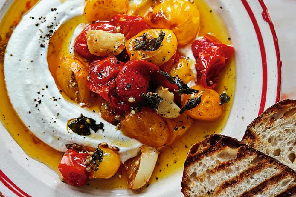 Whipped feta with confit tomatoes (Kristin Perers/PA)
