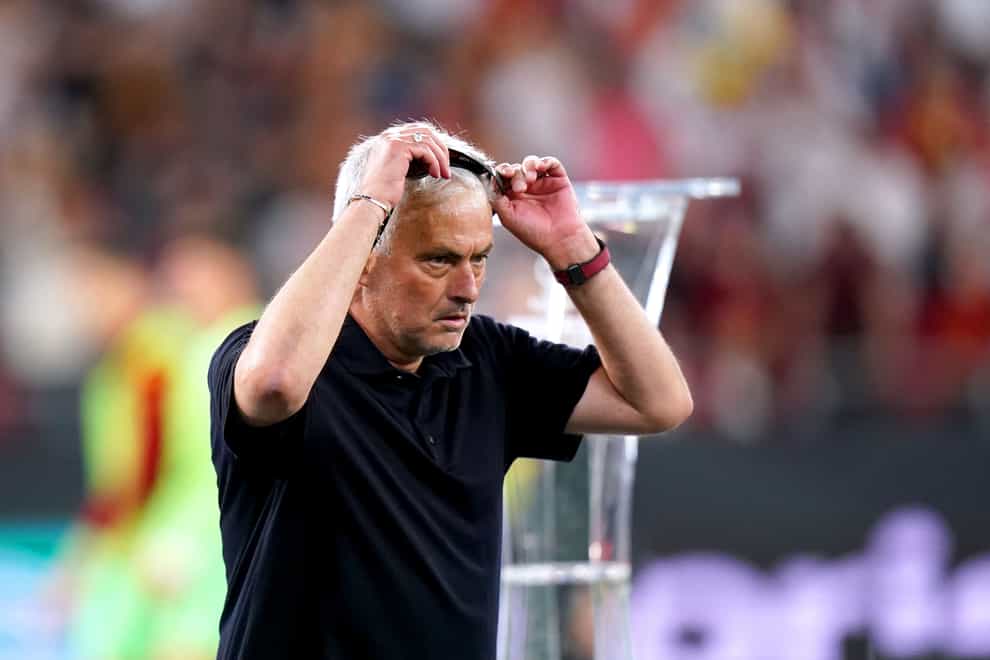 Roma manager Jose Mourinho removes his runner up medal after losing the UEFA Europa League Final at the Puskas Arena, Budapest. Picture date: Wednesday May 31, 2023.