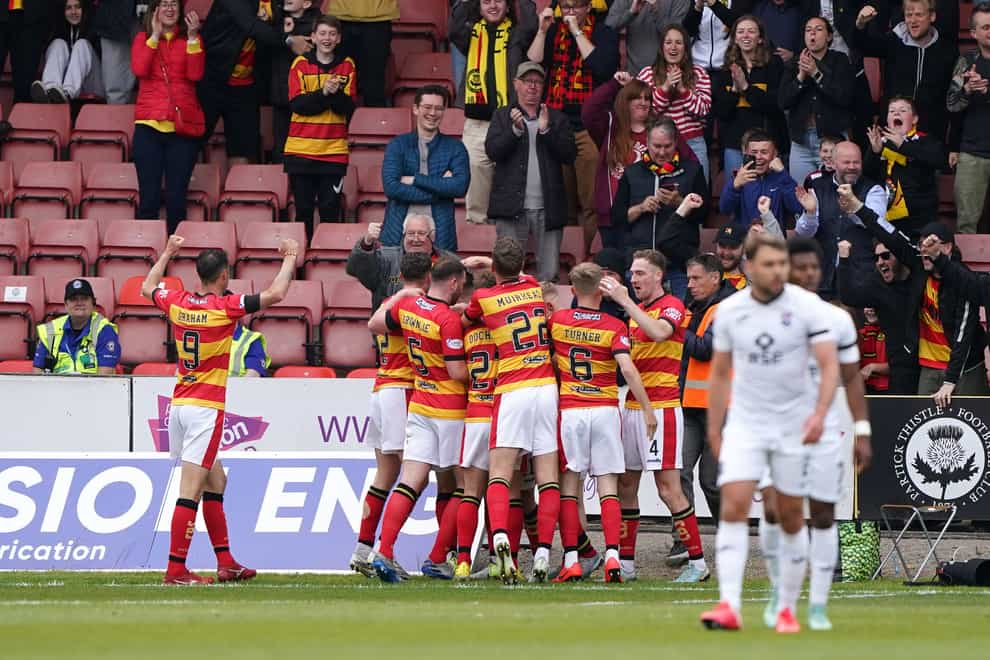 Partick Thistle’s Aidan Fitzpatrick (hidden) celebrates the opener against Ross County (Andrew Milligan/PA)