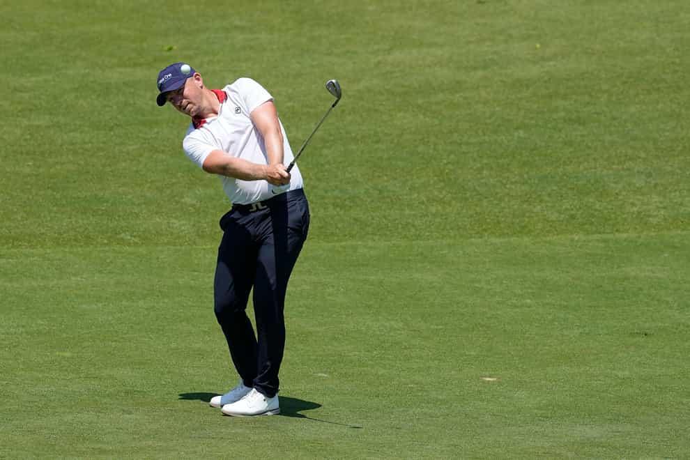 Matt Wallace, of England, hits to the 18th green during the first round of the Memorial golf tournament, Thursday, June 1, 2023, in Dublin, Ohio. (AP Photo/Darron Cummings)