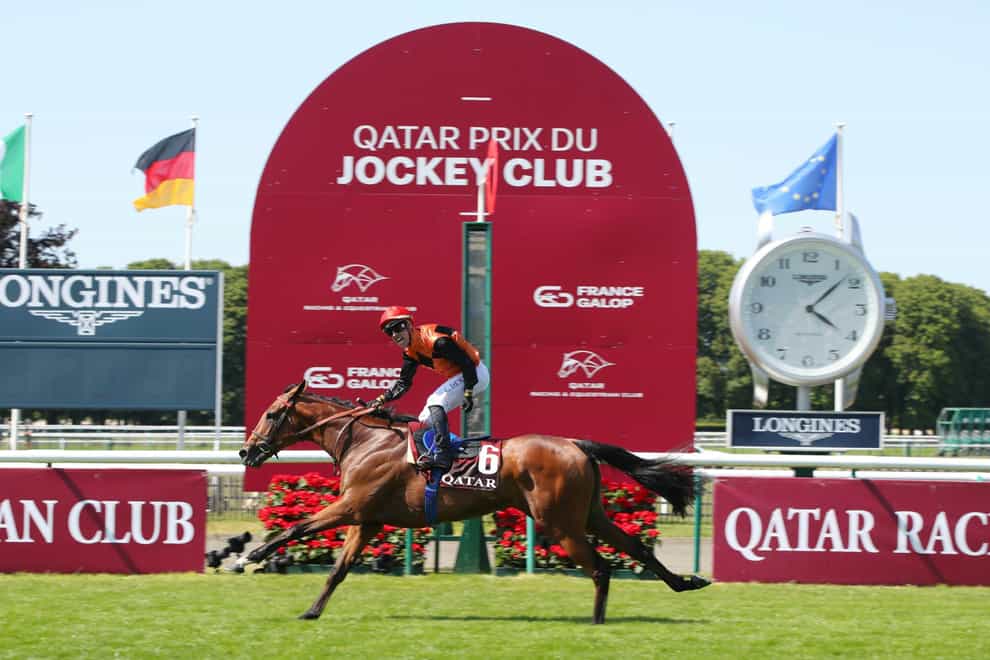 Ace Impact winning the Qatar Prix du Jockey Club (ScoopDyga/France Galop)