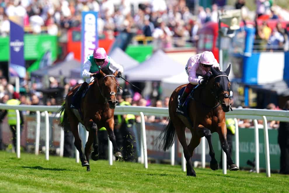 Westover (left) chases home Emily Upjohn in the Coronation Cup at Epsom (David Davies/The Jockey Club)