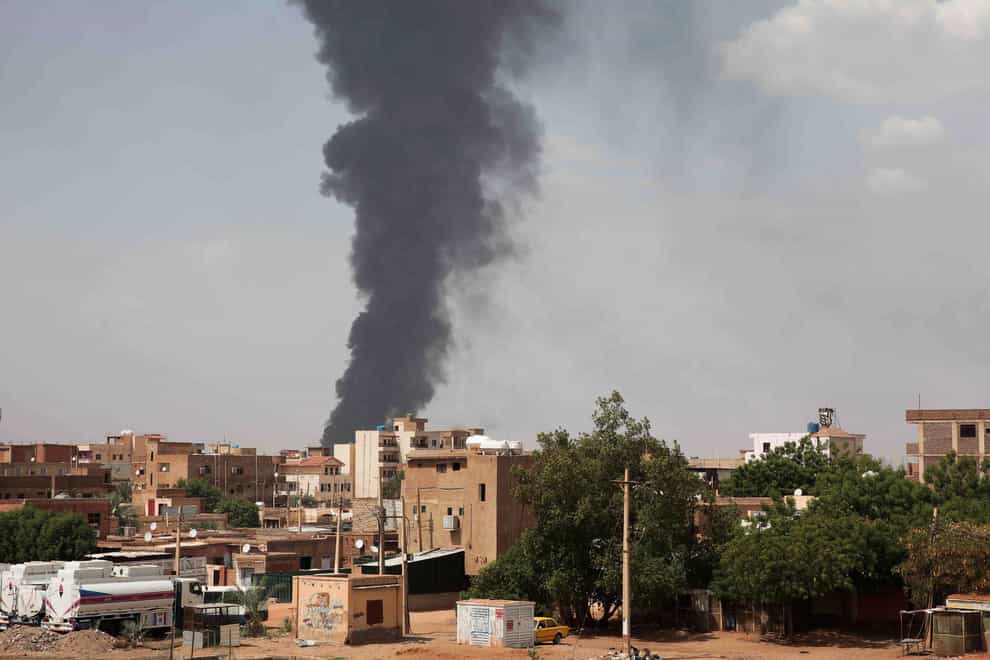 Smoke rises over Khartoum as fighting continues (AP)