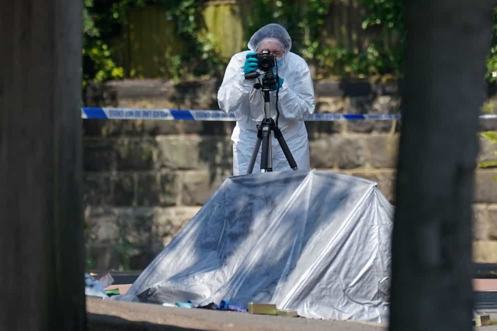 A police forensic officer at the scene on Magdala road, Nottingham (Jacob King/PA)